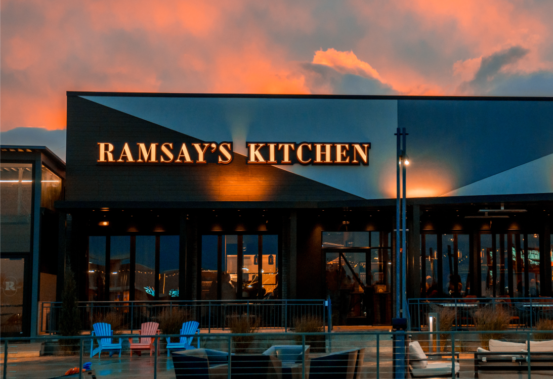 Ramsay’s Kitchen restaurant shopfront at sunset.